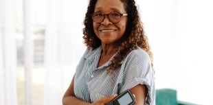 Woman monitoring blood glucose