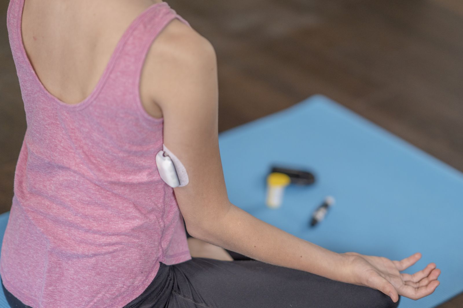 A person with diabetes uses the Omnipod 5 AID system