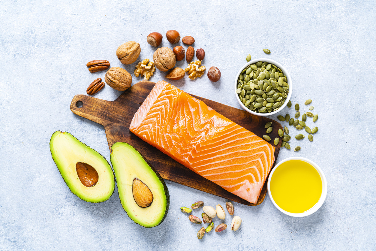 Eating healthy fats - from foods like avocados, seafood, and nuts and seeds - can help lower triglycerides