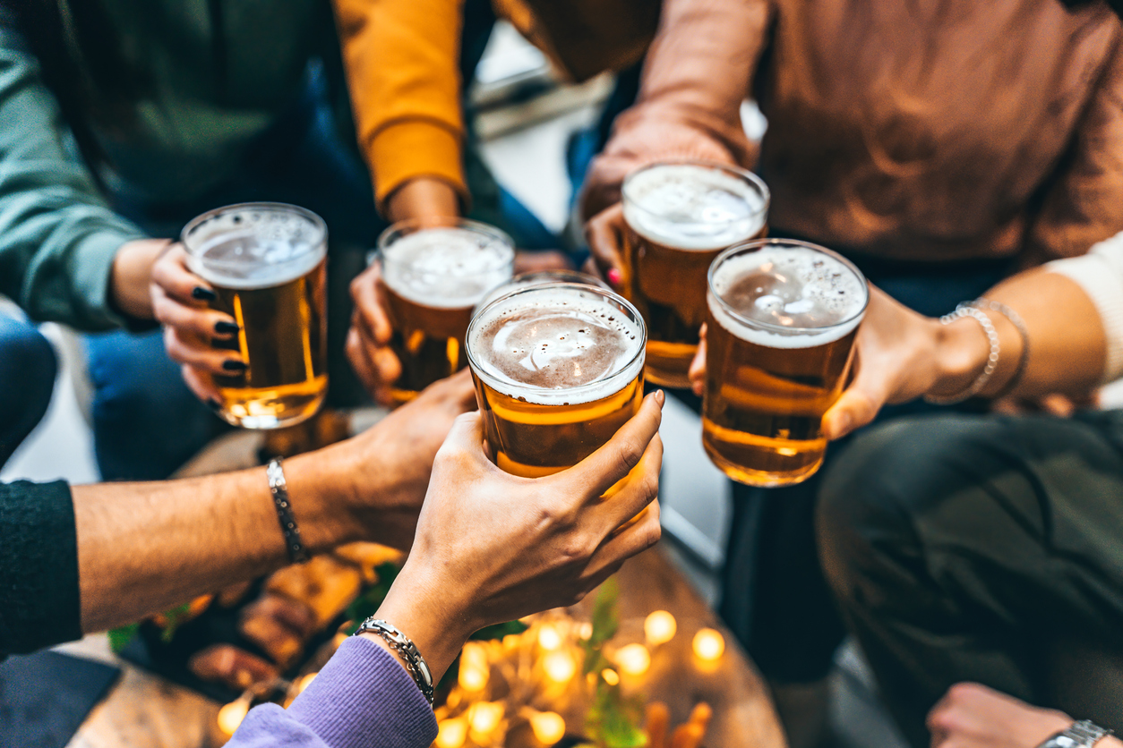 A group of people drinking beer together