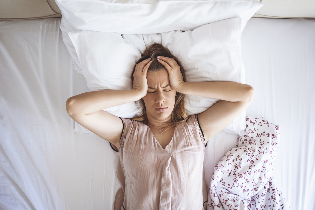 A person with diabetes struggles with disrupted sleep due to nighttime hypoglycemia