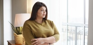 Woman with overweight thinking