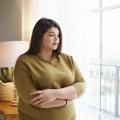 Woman with overweight thinking